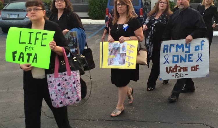 people protesting against dr. fata people protesting against dr. fata
