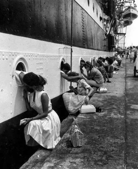 The soldiers of WWII get their last kiss before leaving