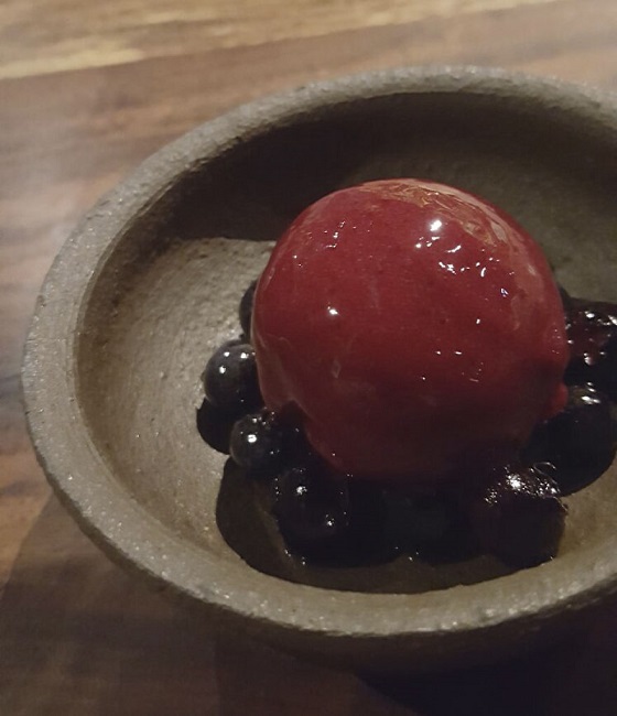 Brandy macerated blueberries topped with sorbet and brandy