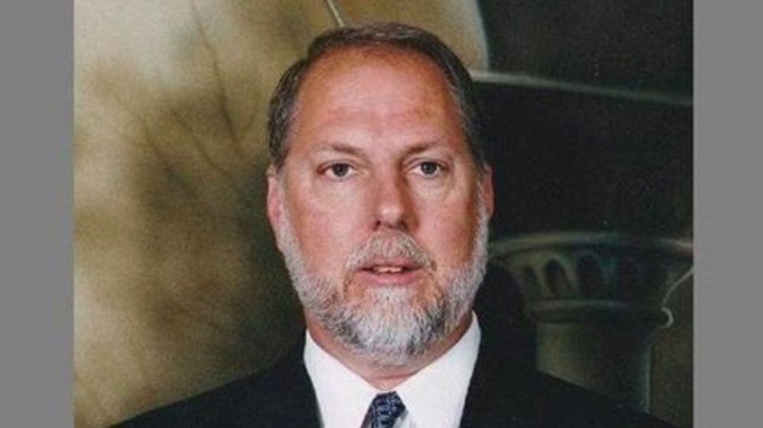 Pastor Matthews sues Holmes claiming that she decided to give more money to him Pastor Matthews sues Holmes claiming that she decided to give more money to him