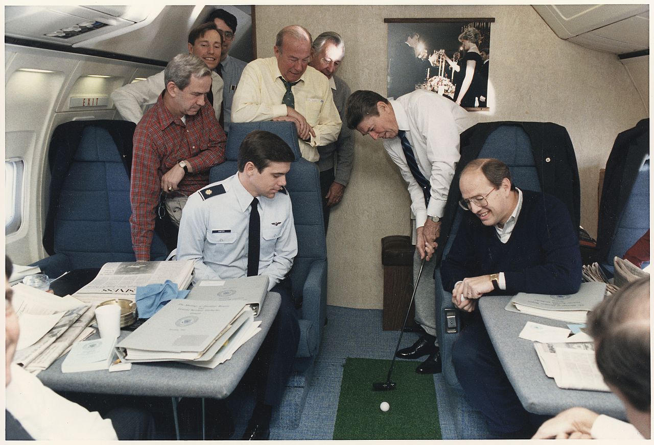President Reagan putting a golf ball around Air Force One