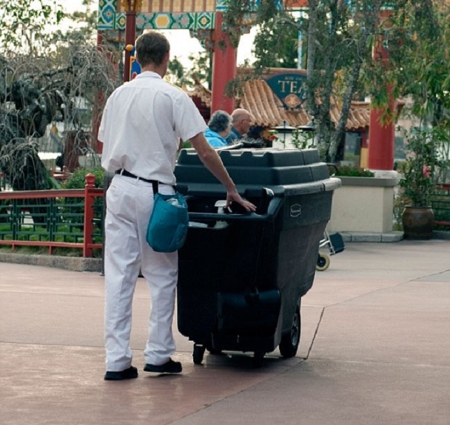 The Disney staffs are expected to pick up litter with minimum of fuss The Disney staffs are expected to pick up litter with minimum of fuss