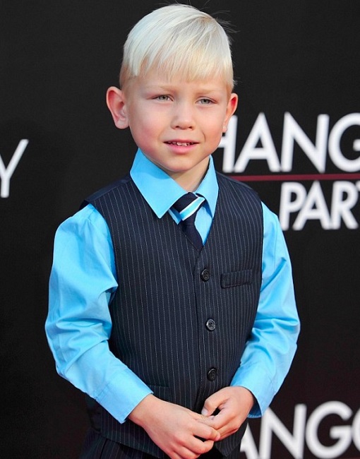 Warner Bros. posted a photo of well-dressed Grant Holmquist on their official Instagram page