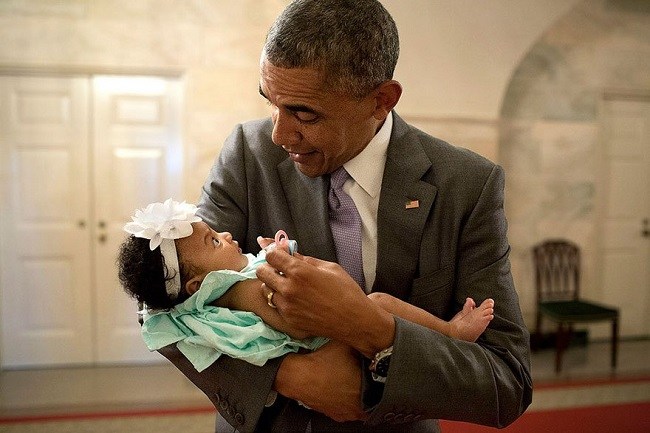 Obama Holding the Child of One of His Staff Members. Obama Holding the Child of One of His Staff Members