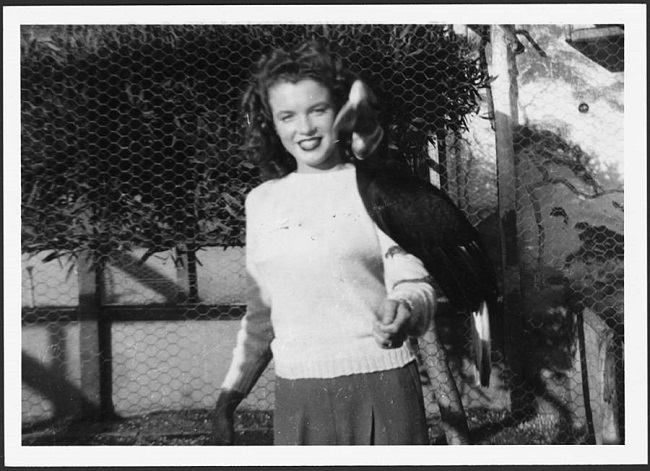 A very cheerful Norma Jeane Mortenson is seen at a zoo