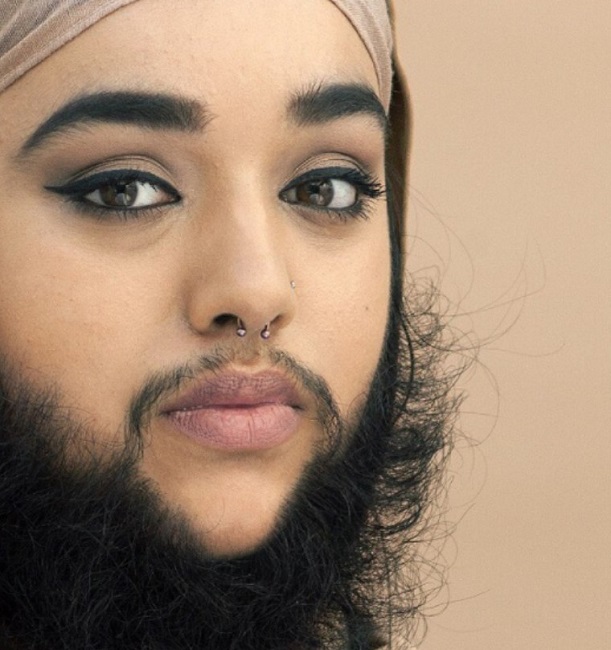 Some women are unapologetic about their facial hairs or beards Some women are unapologetic about their facial hairs or beards