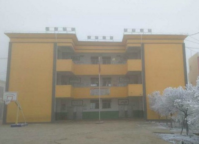 The boy travels a great distance to reach school every day The boy travels a great distance to reach school every day