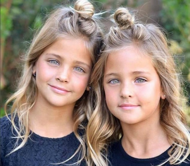 The twin girls are loving the modeling assignments The twin girls are loving the modeling assignments