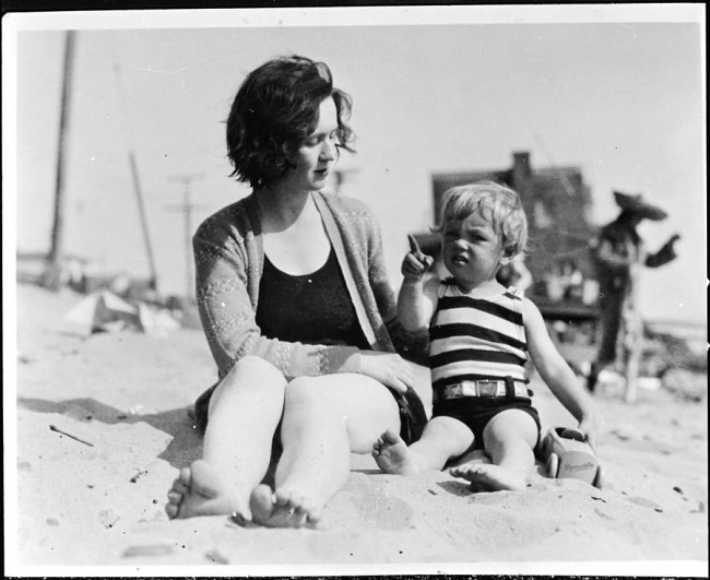 This is a picture of a 3-year-old Norma Jeane Mortenson who is sitting with her mother Gladys Baker