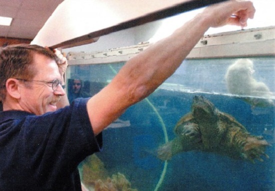 Crosland put the puppy into the tank Crosland put the puppy into the tank