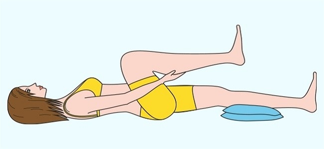 Place two firm pillows beneath your calves Place two firm pillows beneath your calves