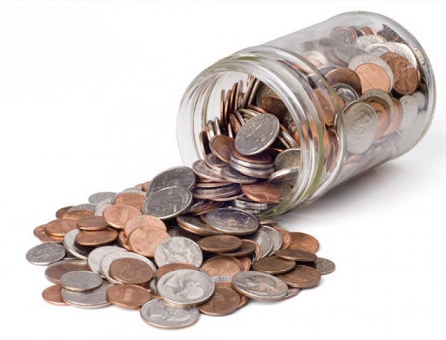 Collecting coins in jar Collecting coins in jar