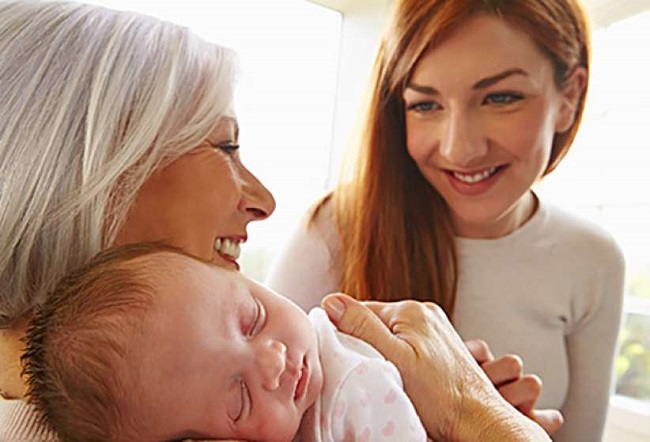 Cuddling infant Cuddling infant