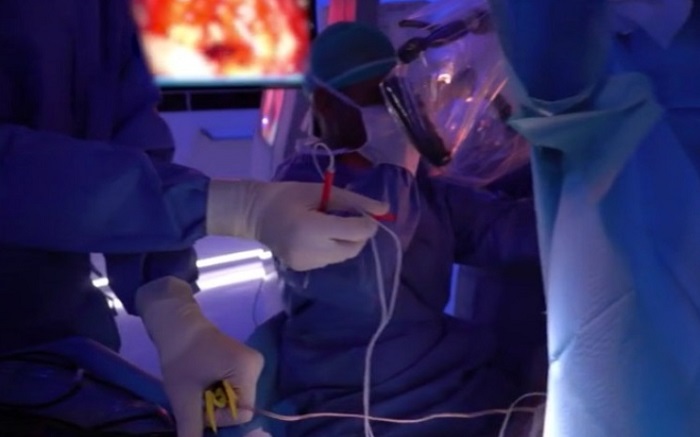 A specialized team, along with specialized equipment for the surgery