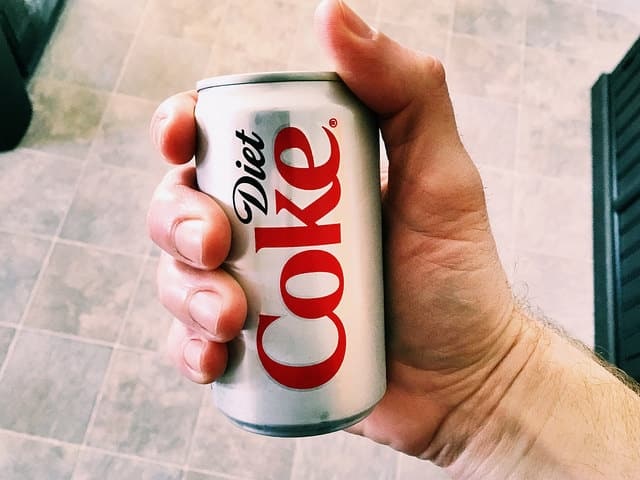 Diet cola has a higher percentage of artificial sweetener
